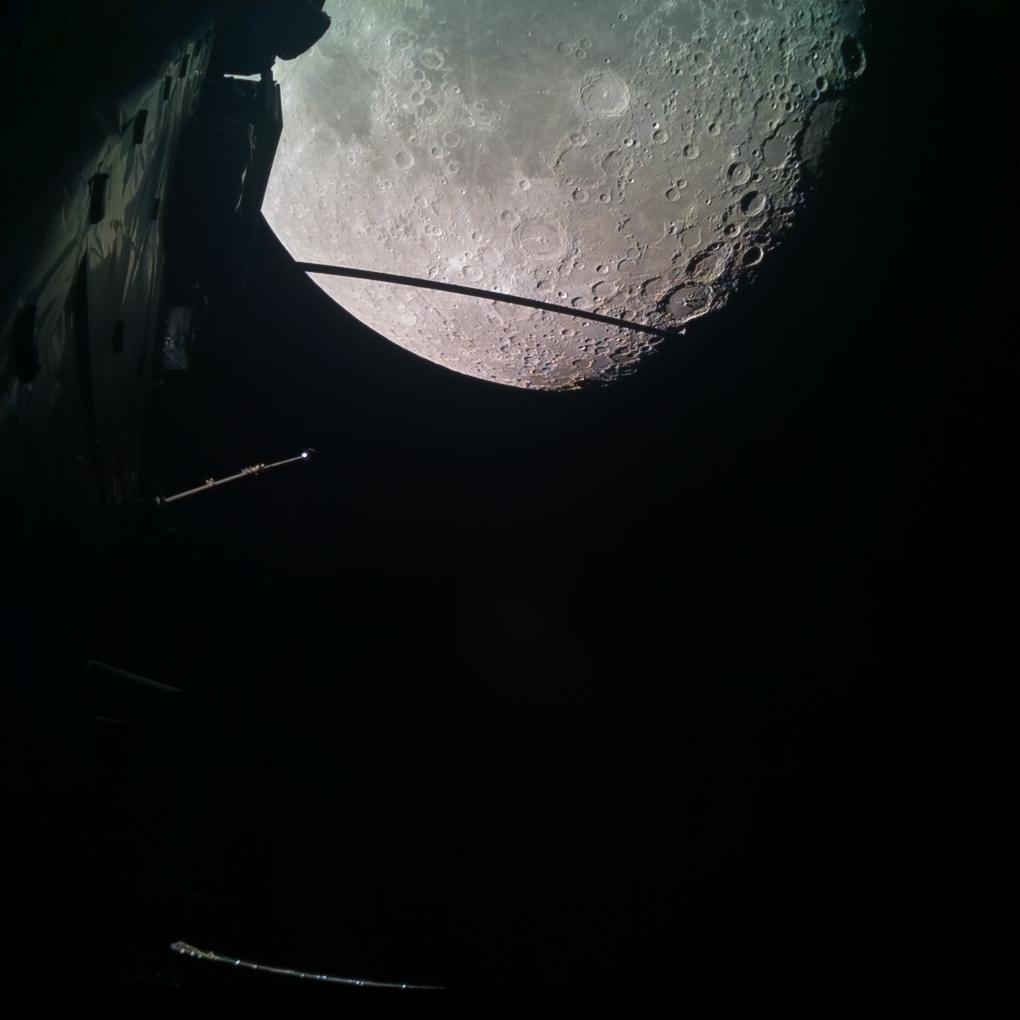 Spacecraft zooms by the moon, captures sci-fi footage